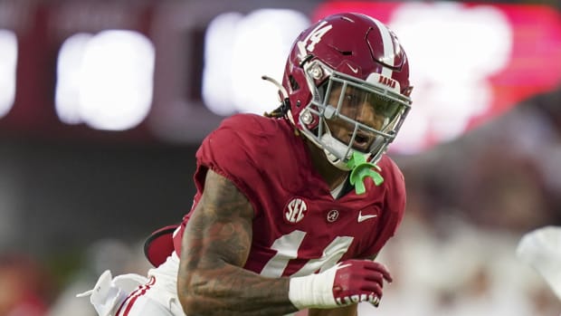 Alabama Crimson Tide defensive back Brian Branch (14) pursues Vanderbilt Commodores running back Ray Davis (2) during the first half at Bryant-Denny Stadium.
